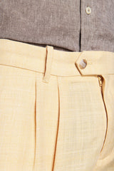 Linen blend Bermuda shorts with yellow pleats