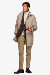 Beige quilted trench coat