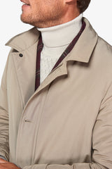 Beige quilted trench coat