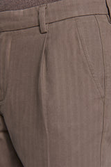 Mud herringbone trousers