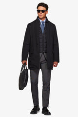 Black technical coat with bib