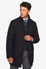 Black technical coat with bib