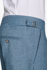 Flannel trousers with light blue pleats