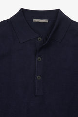 Knitted polo shirt with blue buttons