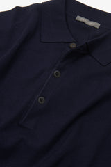 Knitted polo shirt with blue buttons