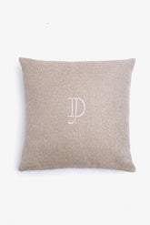 Medium cushion with small beige embroidery