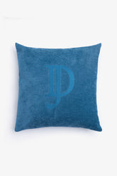 Medium cushion with large teal embroidery