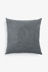 Medium cushion with large gray embroidery