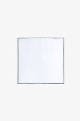 White clutch bag with contrasting blue border