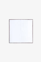 White clutch bag with contrasting brown piping