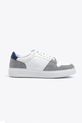 Light gray perforated bi-material sneakers