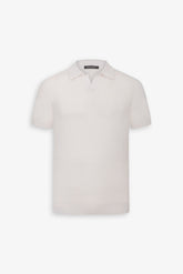 White open-neck knitted polo shirt
