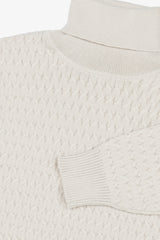 Butter cable knit turtleneck sweater