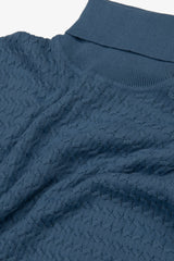 Light blue cable knit turtleneck sweater