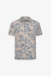 Polo shirt in light blue flower patterned piquet