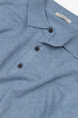 Knitted polo shirt with light blue buttons