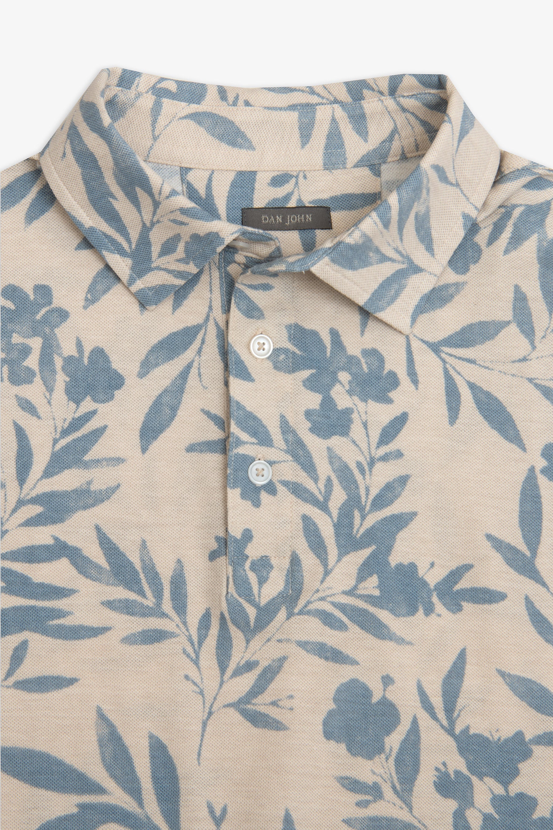 Polo in piquet fantasia fiore celeste-Dan John