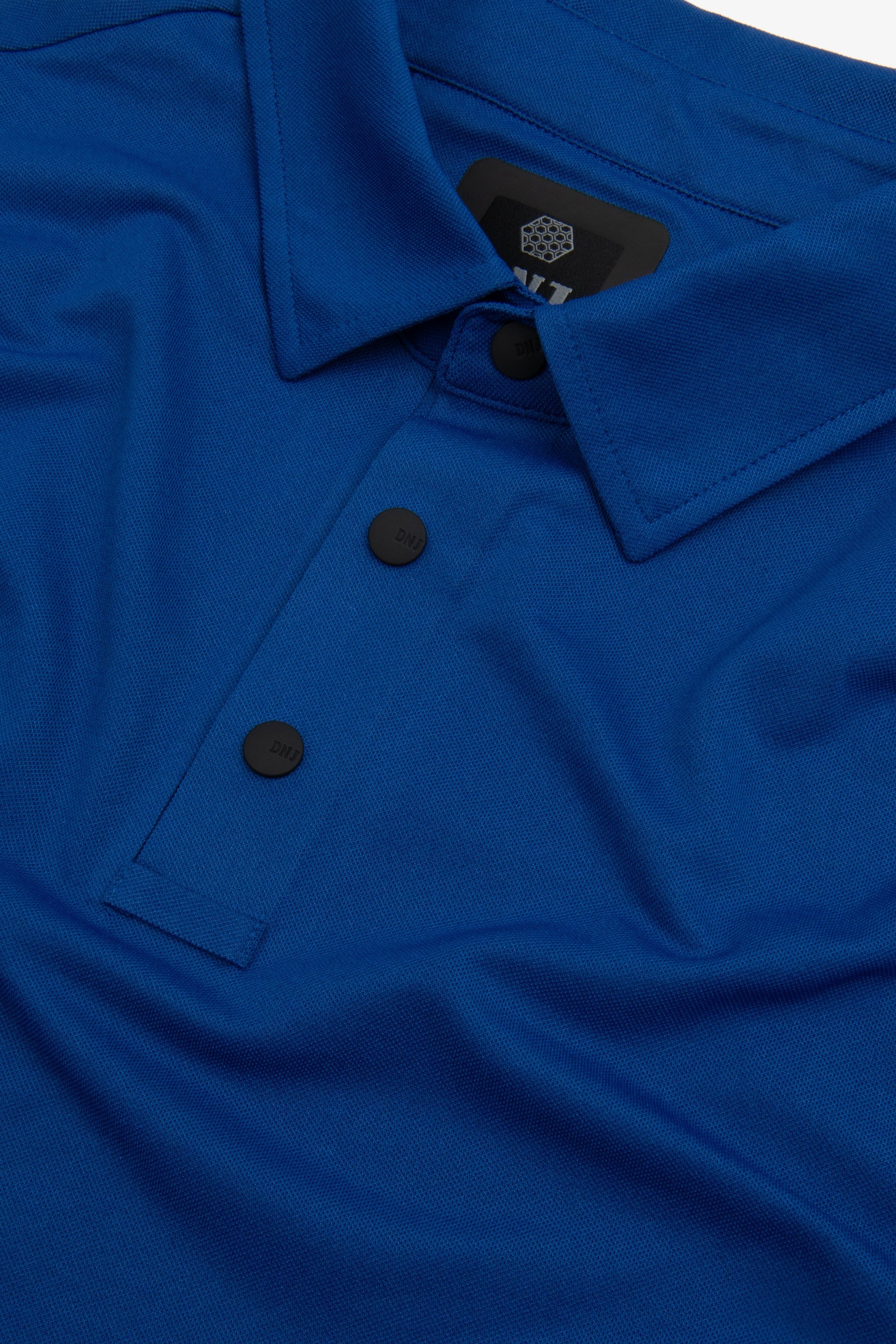 Polo tecnica con bottoni royal DNJ-Dan John