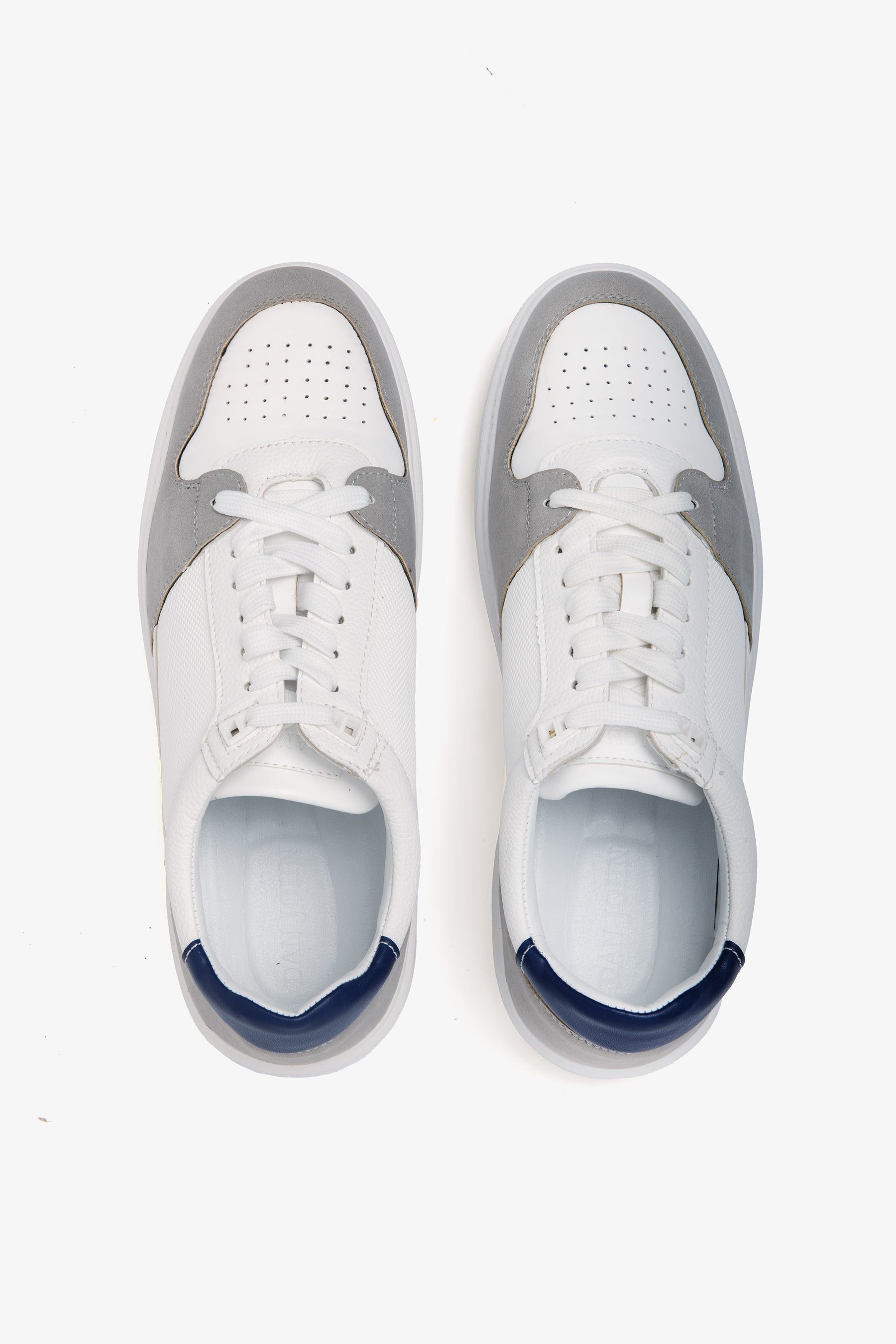 Light gray perforated bi-material sneakers