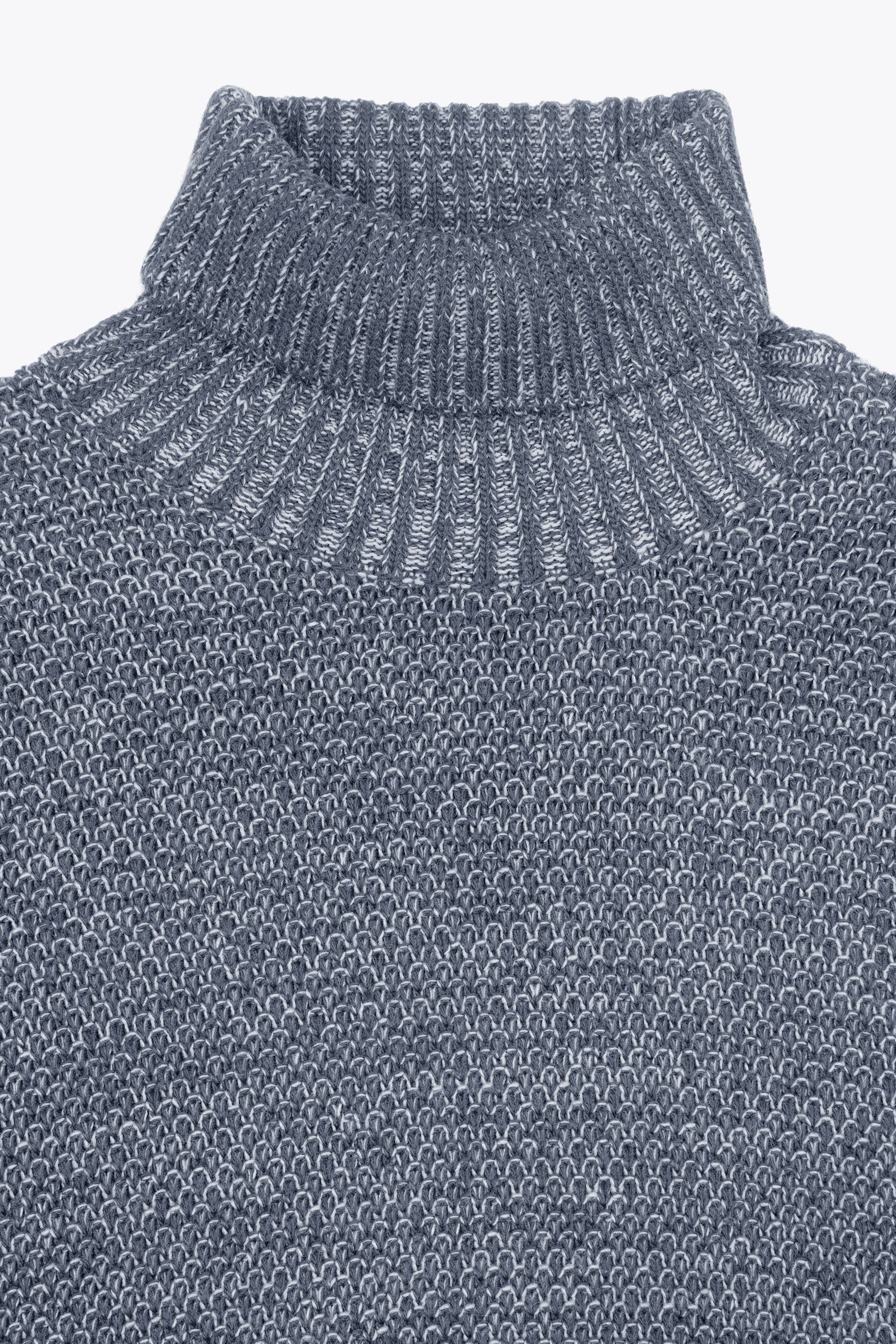 Two-tone light blue textured turtleneck sweater