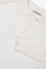 Cream open-neck knitted polo shirt